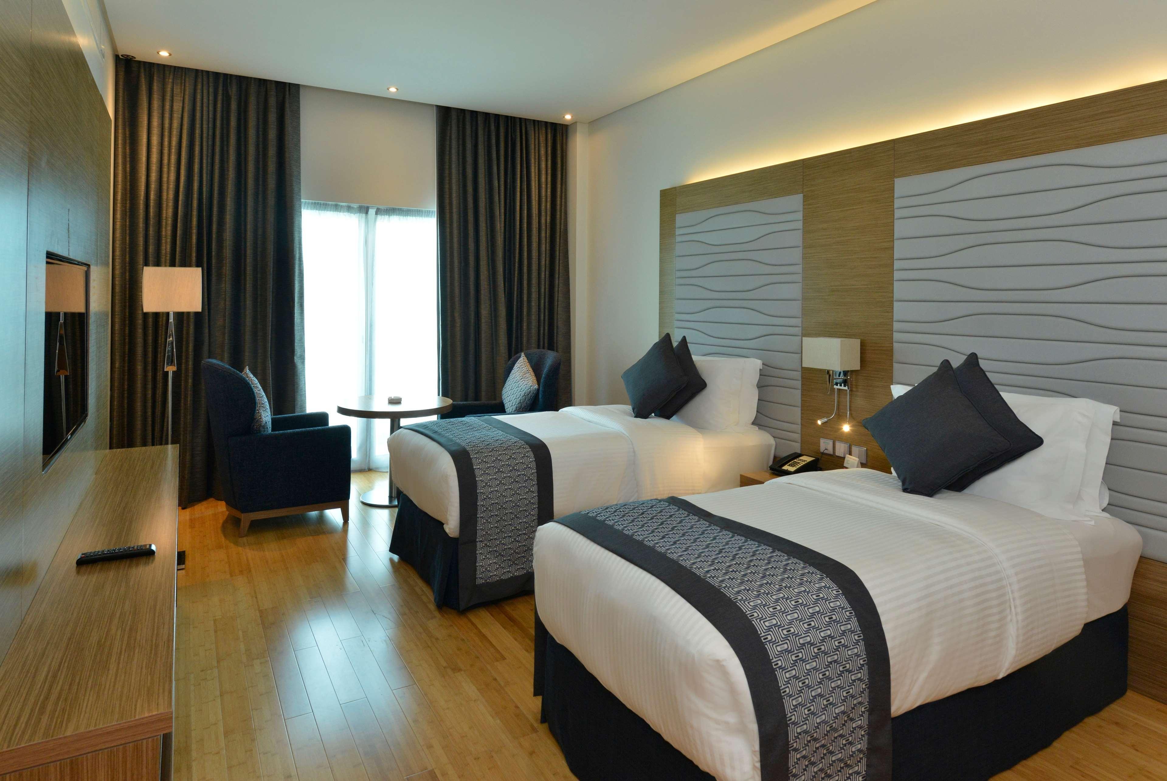 Ramada By Wyndham Manama City Centre Exterior photo